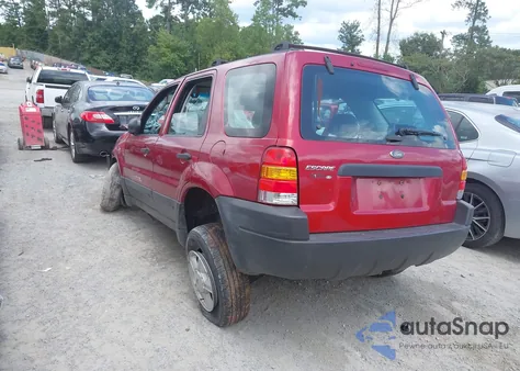 2003 Ford Escape Xls z USA, uszkodzony, nr VIN 1FMYU02113KE21176